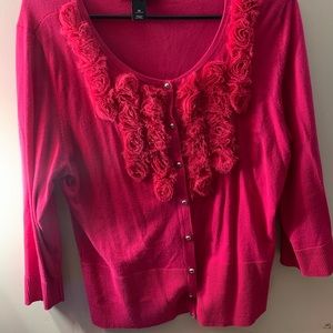 Pink button up sweater with ruffles